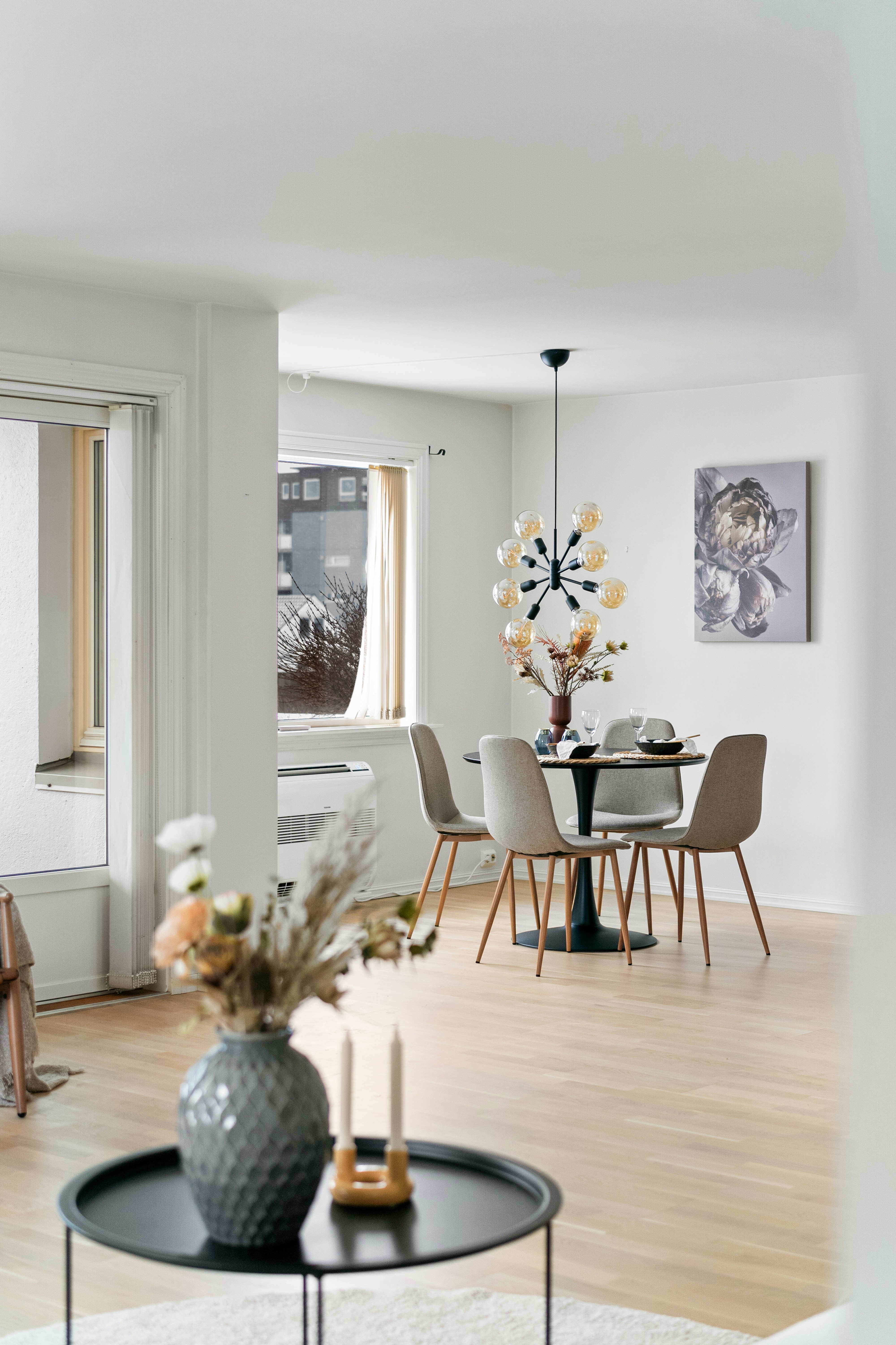 A living room filled with furniture and a table